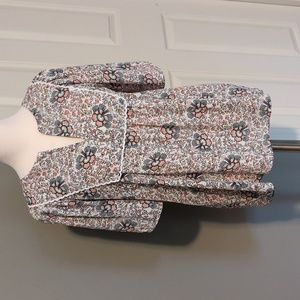 Loft Short sleeve floral blouse with detail.
